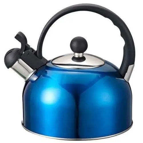 Vintage blue whistling tea kettle on stovetop