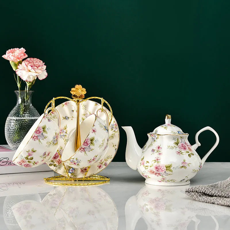 Vintage English porcelain tea set with cottage garden floral motif and gold rim accents