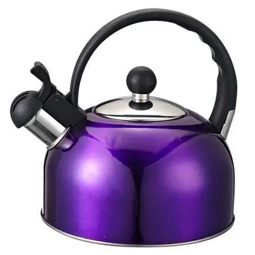 Vintage purple tea kettle on an induction cooktop, ready to boil