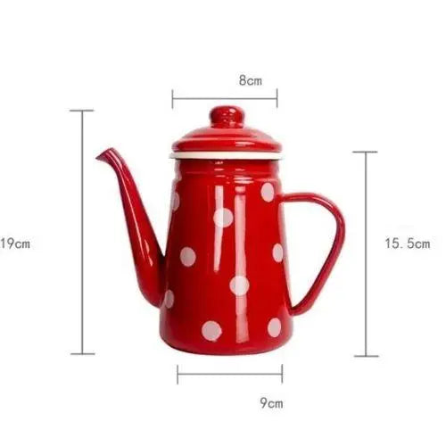 Red polka dot tea kettle size comparison next to standard mug