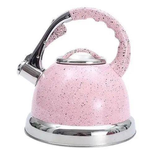 Rose pink whistling tea kettle on kitchen counter