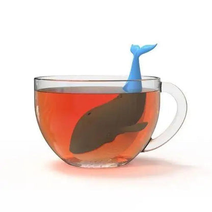 Cute whale infuser open showing loose leaf tea inside food-grade silicone body