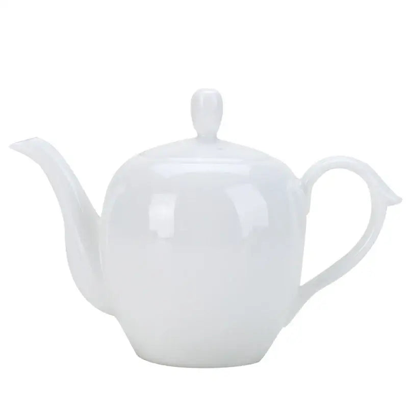 White ceramic teapot with lid and spout