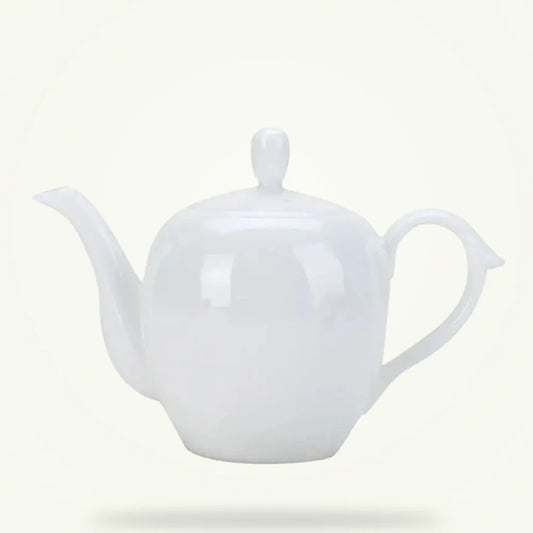 White Ceramic Teapot for One, product photo on a plain background