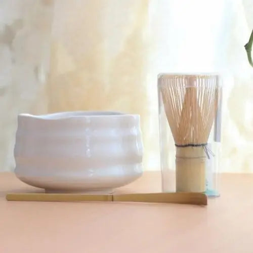 White chawan tea bowl with matcha and whisk