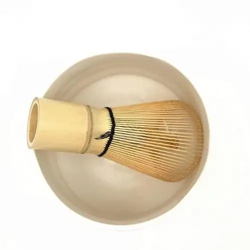 Japanese white chawan bowl with green tea powder
