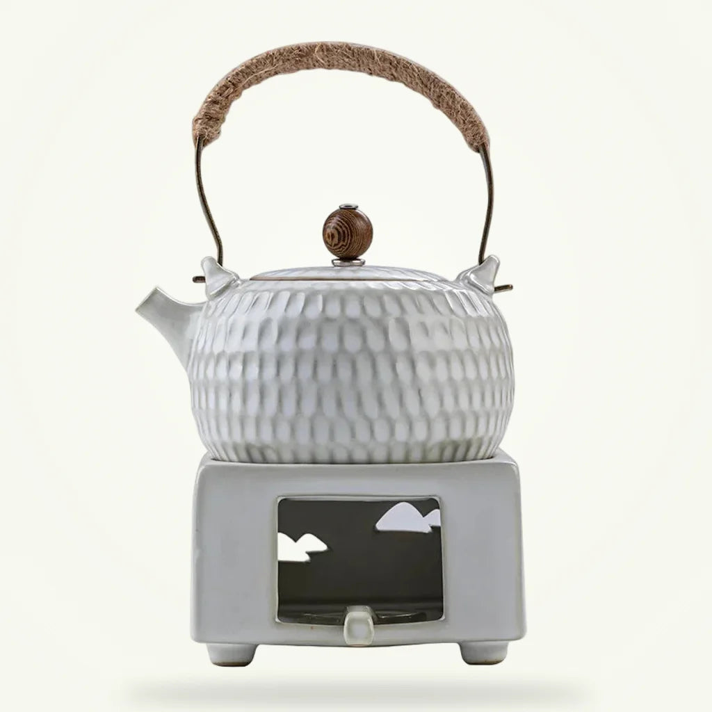 White Chinese ceramic teapot with braided rope handle, full product view on plain background