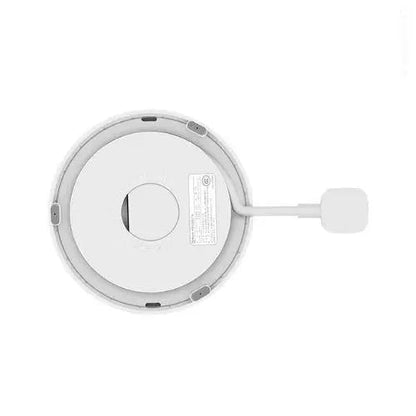White electric kettle on its base with cord