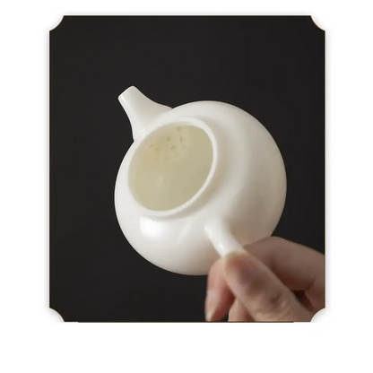 Small white teapot for tea ceremony