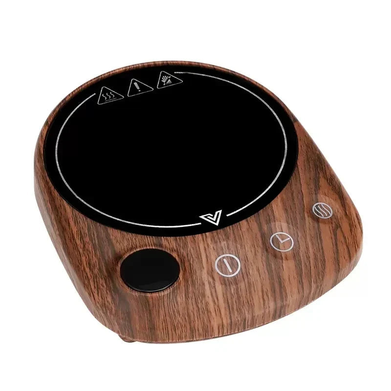 Mug warmer keeping hot tea at temperature, steam rising from cup