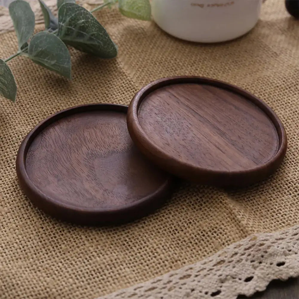 Dark brown wooden coaster set for tea cups