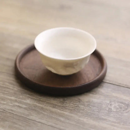 Wooden coasters in a pack for tea lovers