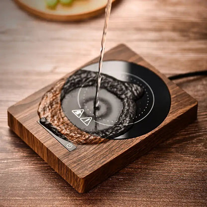 Wooden mug warmer in brown finish with a mug