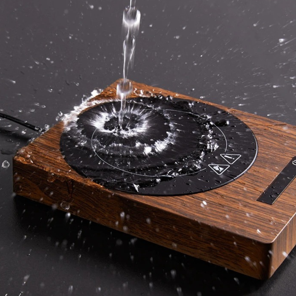 Mug warmer with a cup of coffee and USB plugged in
