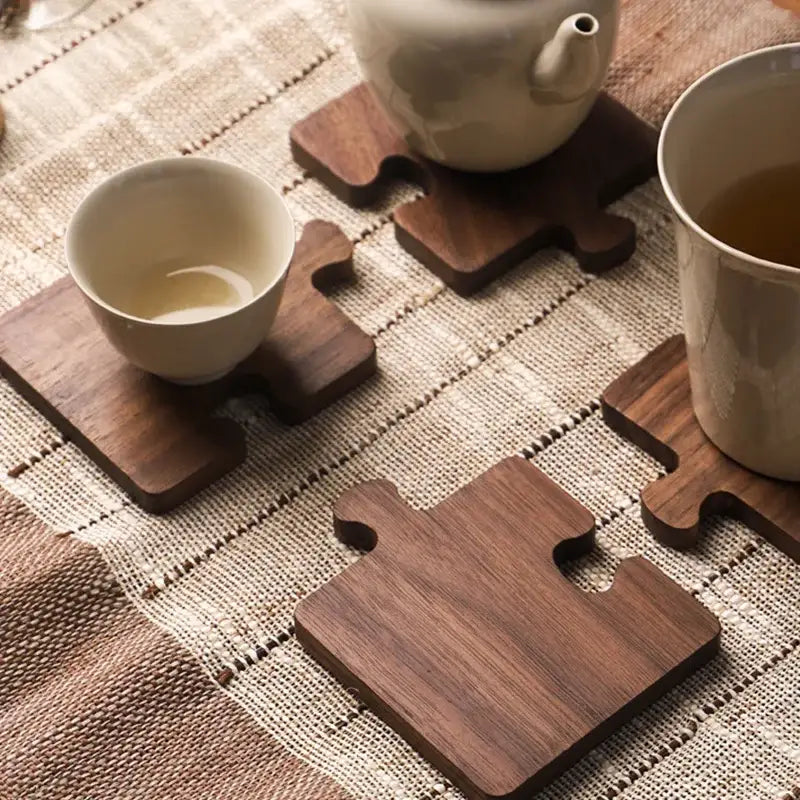 Wooden puzzle coaster with cup of tea, cozy