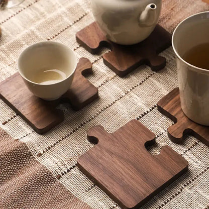 Wooden puzzle coaster with cup of tea, cozy