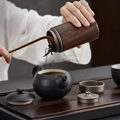 Wooden tea caddy side profile showing natural wood grain and finish