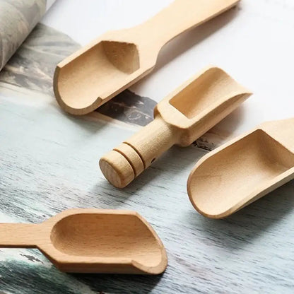 Wooden tea spoon in a jar of loose leaf tea