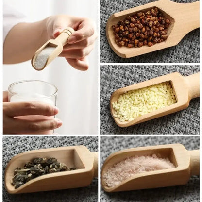 Hand holding a wooden tea spoon with tea