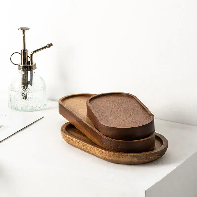 Wooden tea tray with teapot and cup