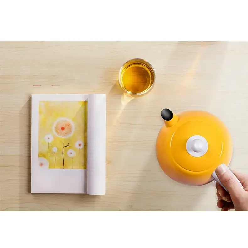 Yellow electric kettle 1L on 360-degree cordless swivel base