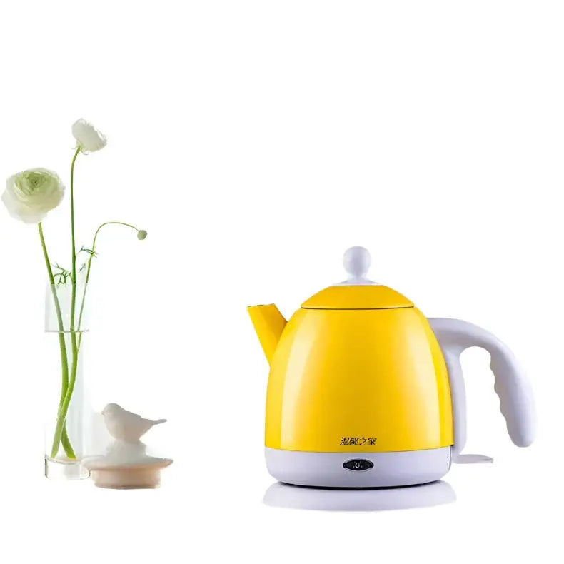 Yellow electric kettle 1L with power cord attached to 360-degree base