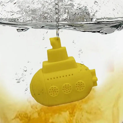Close-up of a yellow submarine tea infuser made of silicone