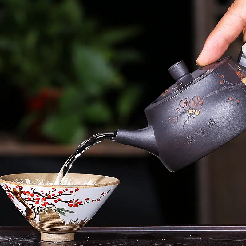 200ml Yixing black zisha teapot for gongfu brewing, side angle showing spout and handle