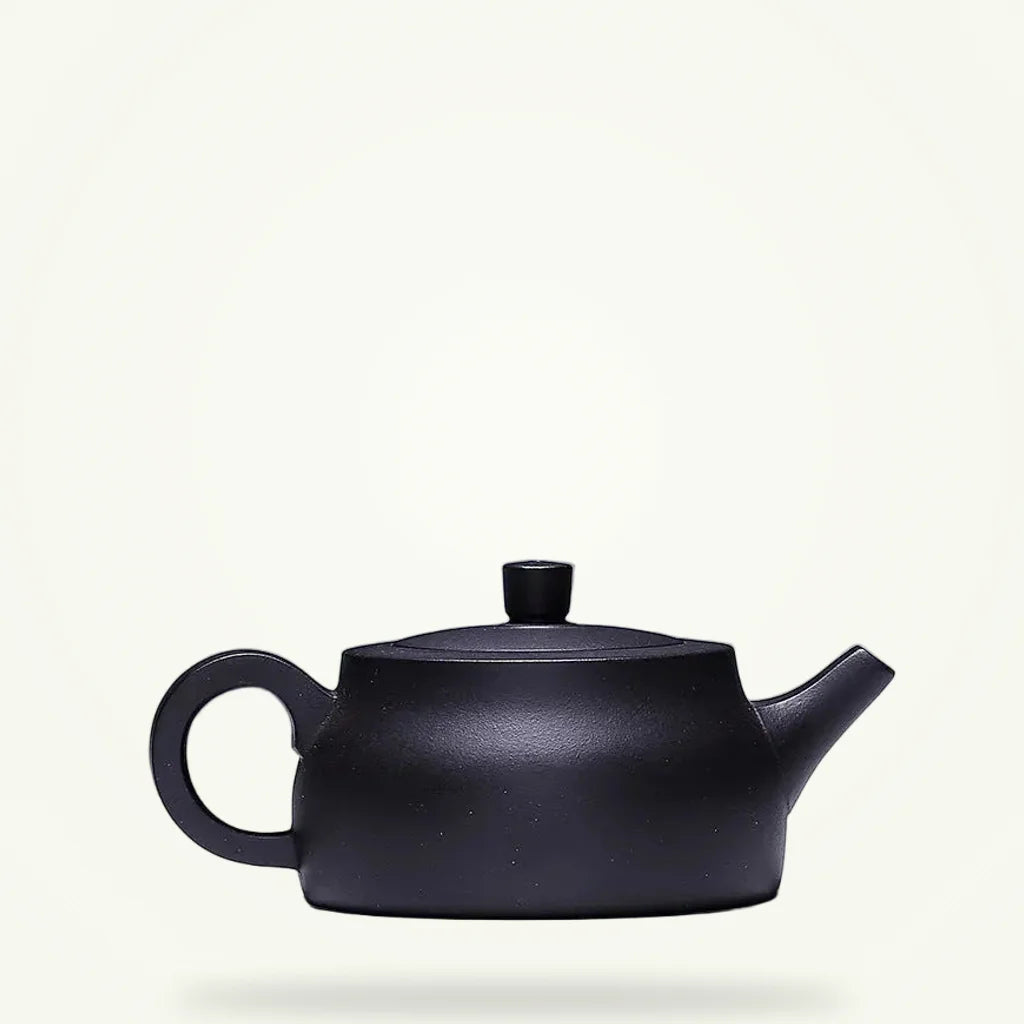 Yixing black clay teapot with flower motif, 200ml, unglazed zisha, full product view