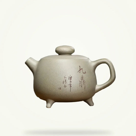 Yixing clay teapot 200ml in green zisha clay, packshot on plain background
