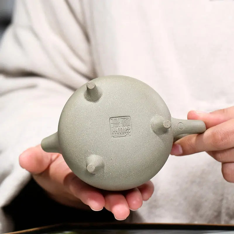Yixing zisha teapot 200ml close-up of unglazed clay surface texture