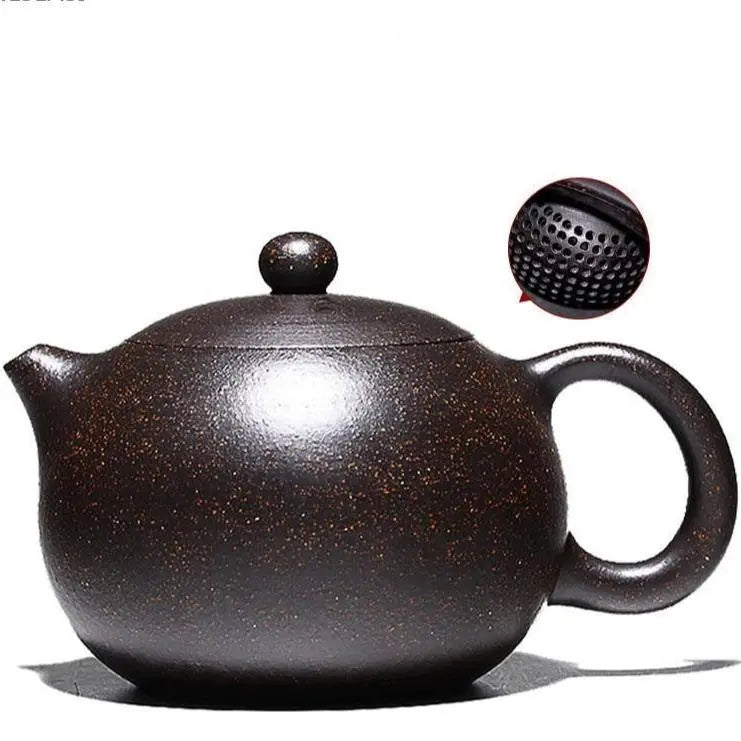 Unglazed Chinese zisha teapot side view showing porous purple clay texture