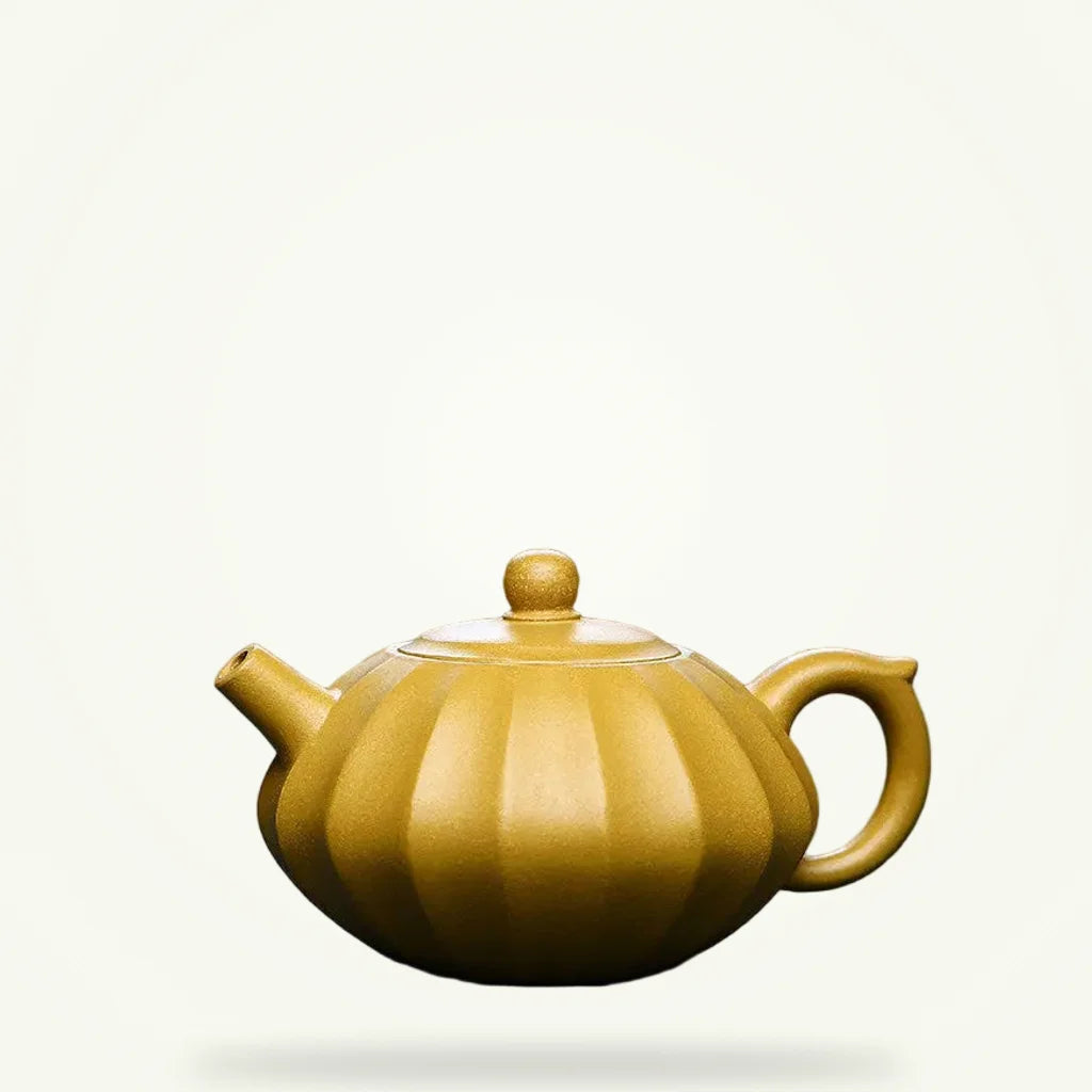Yixing Zisha purple clay teapot 230ml on plain background, unglazed amber clay with lid