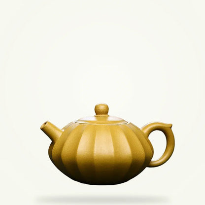 Yixing Zisha purple clay teapot 230ml on plain background, unglazed amber clay with lid