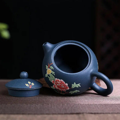Yixing teapot blue flower 230ml with lid open, showing unglazed interior