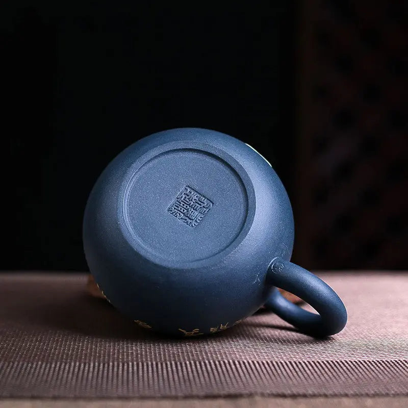Yixing clay teapot blue flower, top view showing lid and handle