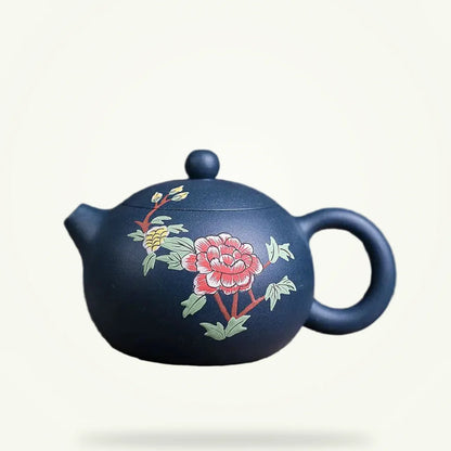 Yixing clay teapot blue flower motif 230ml, packshot on plain background