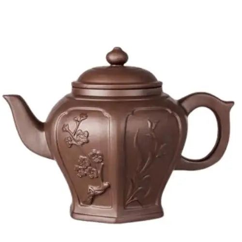 Yixing clay teapot in brown with flower design