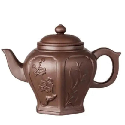 Yixing clay teapot in brown with flower design