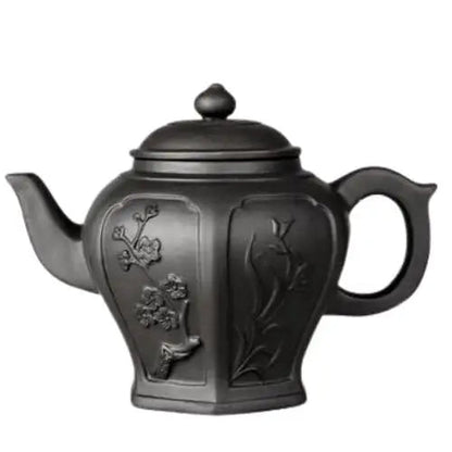 Yixing clay teapot in black with flower design