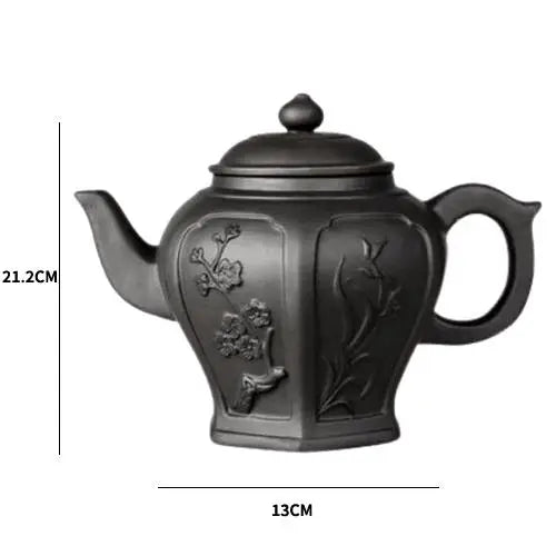 Yixing clay teapot with flower design and cup