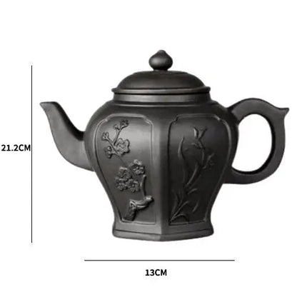 Yixing clay teapot with flower design and cup
