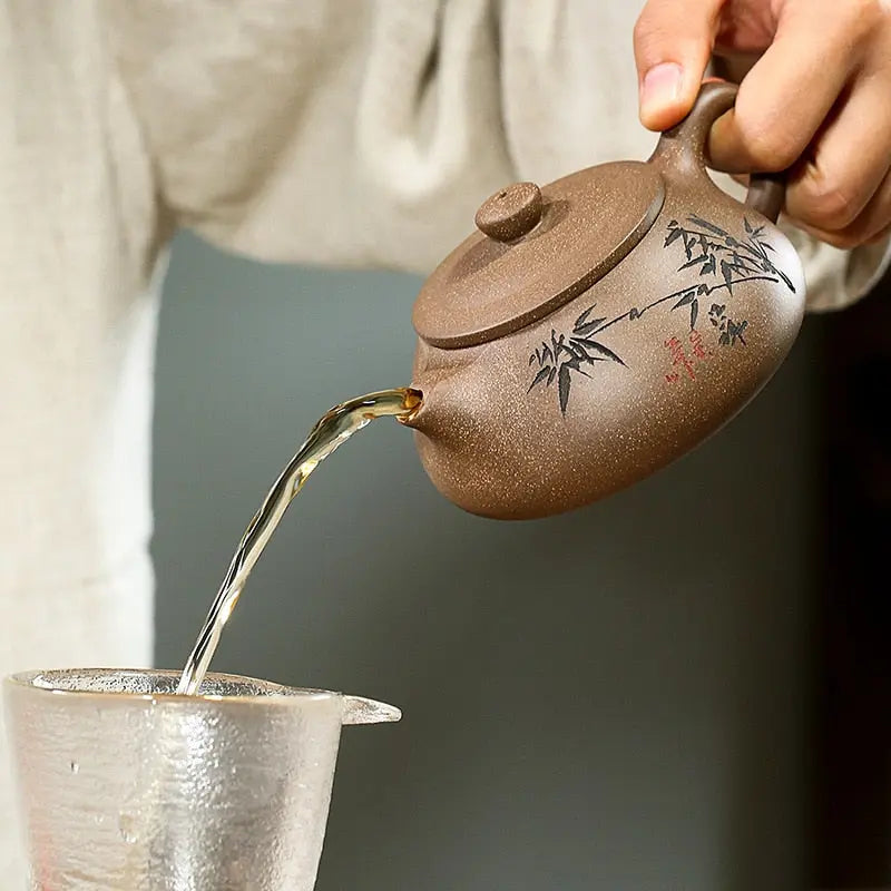 Close-up of hand-carved bamboo motif on 230ml zisha Yixing teapot