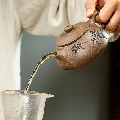 Close-up of hand-carved bamboo motif on 230ml zisha Yixing teapot