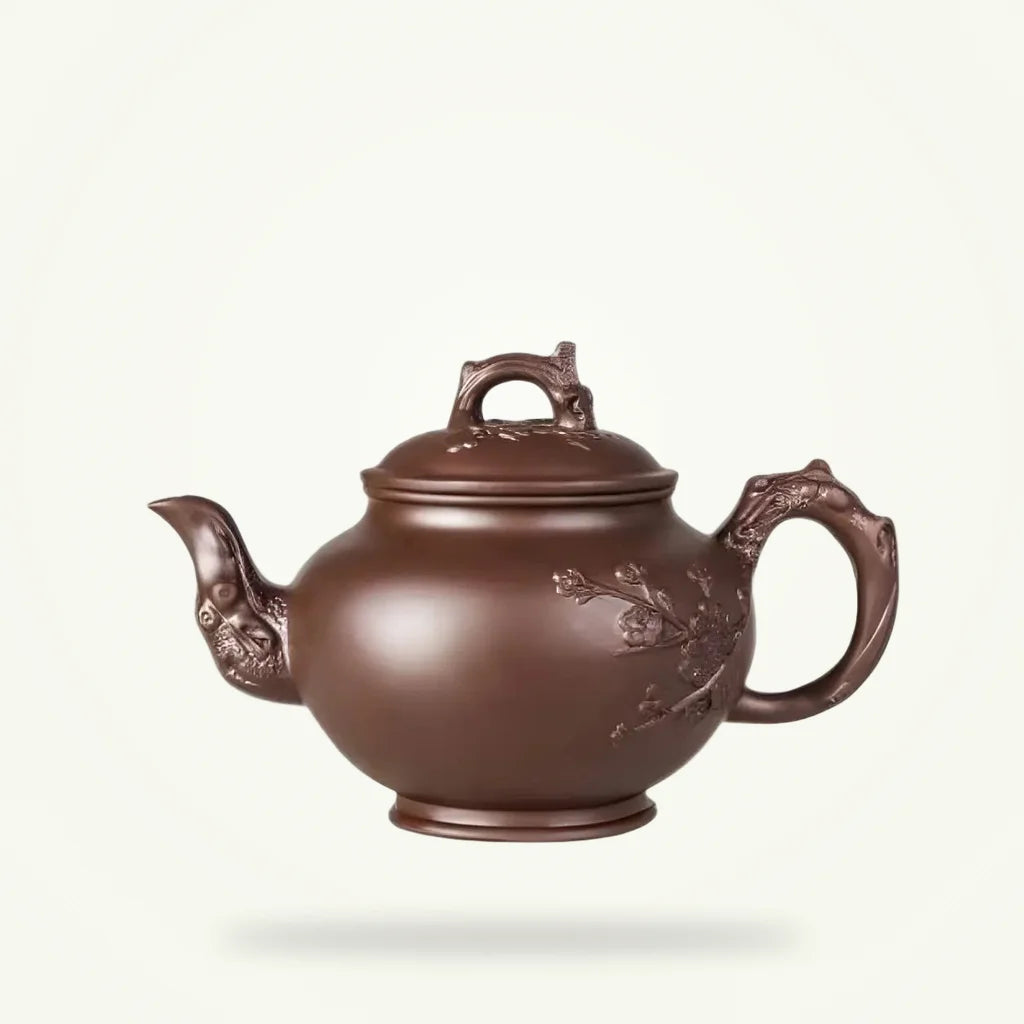 Yixing Clay Teapot with Flower Engraving, 700 ml, product photo on a plain background