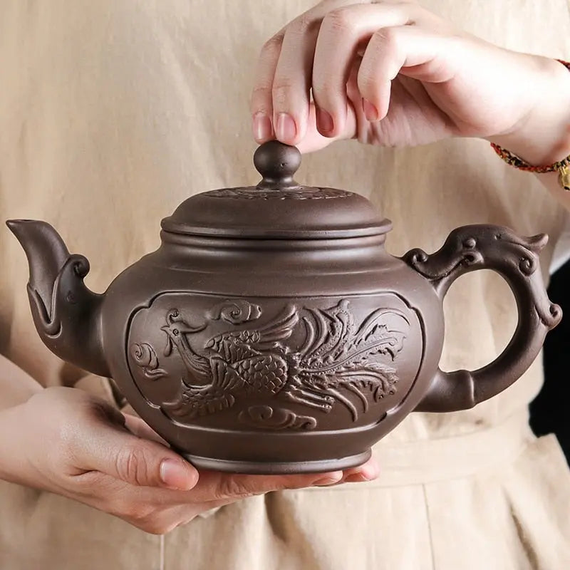 Yixing clay teapot with hand-applied rooster motif, 500ml, front view showing spout and handle