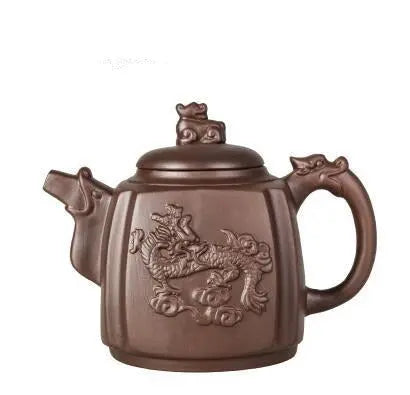 Traditional Chinese Yixing teapot dragon motif side view, unglazed zisha