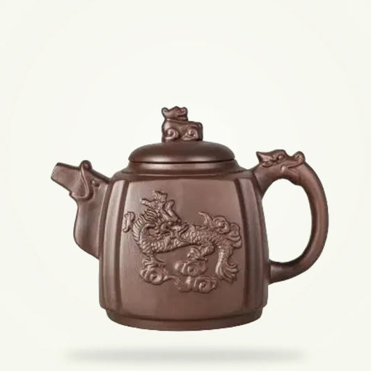 Yixing dragon clay teapot 500ml in purple zisha clay on plain background