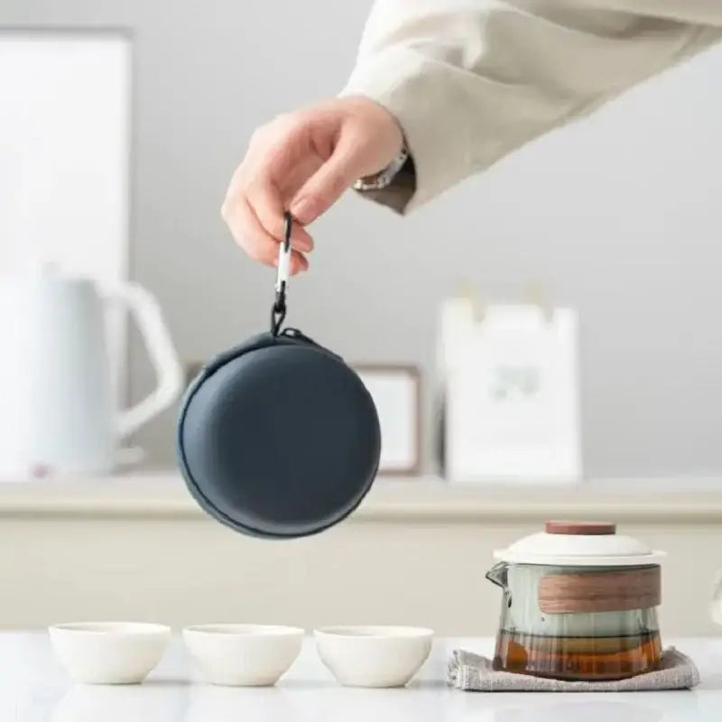Zen Nomade tea set showing teapot and three nesting porcelain cups